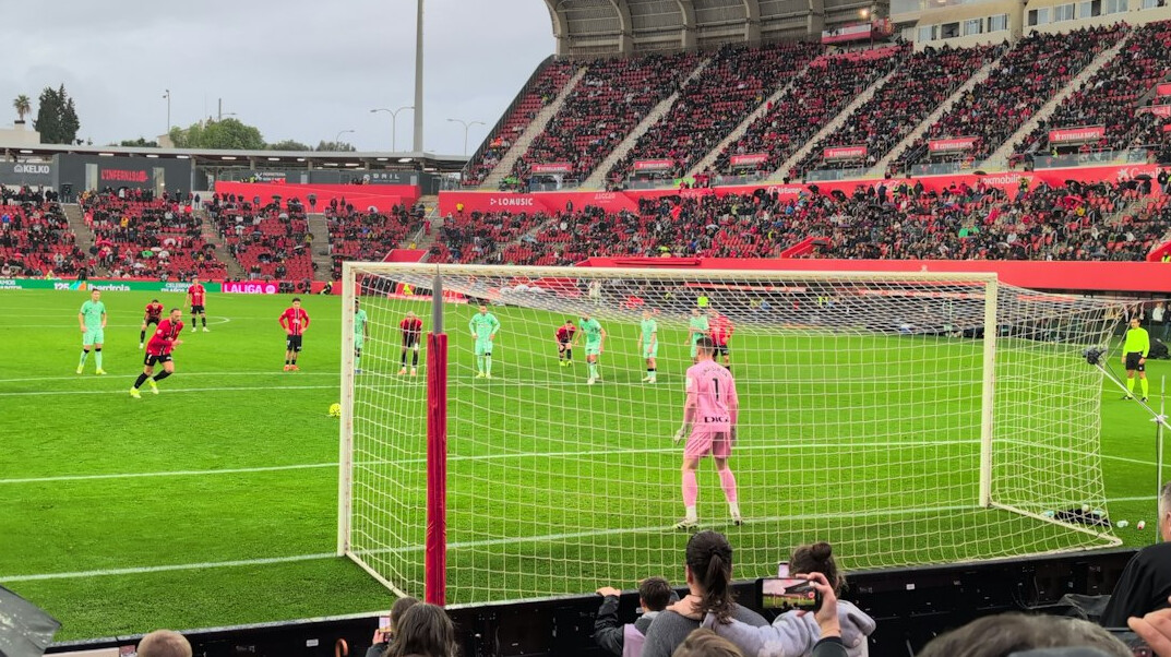 Football stadium filled with fans during a match