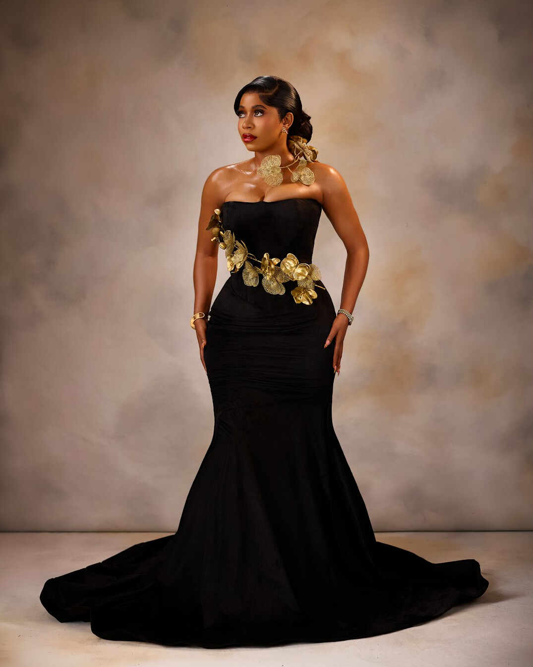 Red carpet event with photographers and flashing cameras