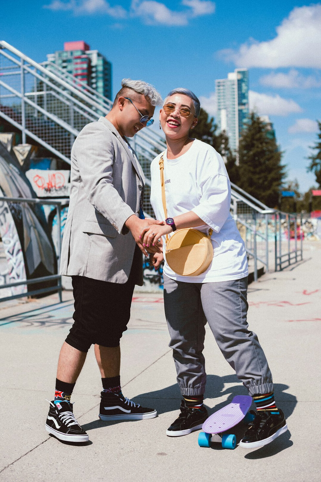 Two professionals shaking hands after a media partnership agreement
